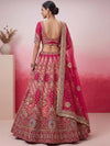 Rani Pink Gadhwal Silk Bridal Lehenga showing close-up intricate skirt embroidery for luxury wedding wear | BharatPlaza