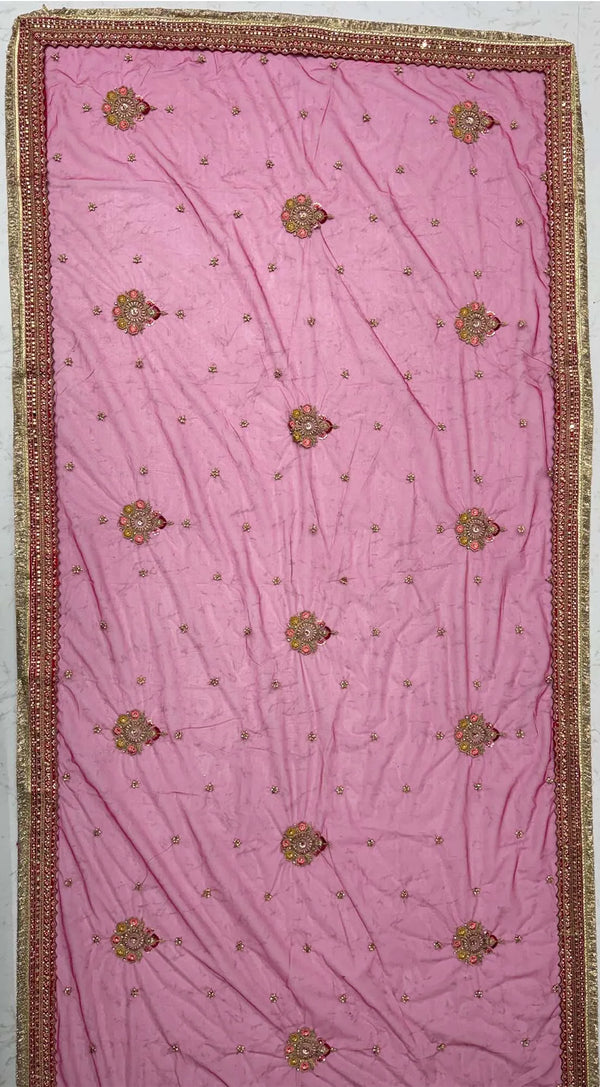 Rani Pink Gadhwal Silk Bridal Lehenga displaying beautiful unstitched heavy blouse fabric for wedding wear | BharatPlaza