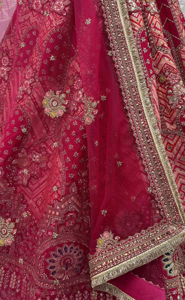 Rani Pink Gadhwal Silk Bridal Lehenga detailing rich gota patti and mirror work for luxury wedding attire | BharatPlaza