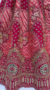 Rani Pink Gadhwal Silk Bridal Lehenga showcasing heavily embroidered patchwork for luxury bridal weddings | BharatPlaza