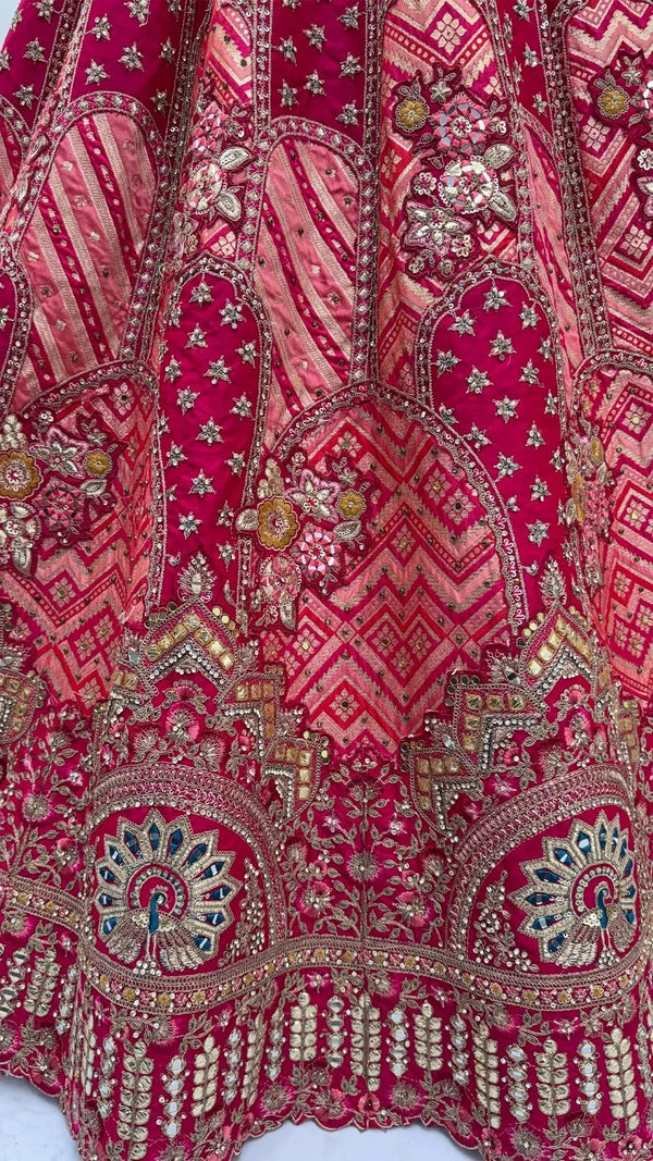 Rani Pink Gadhwal Silk Bridal Lehenga showcasing heavily embroidered patchwork for luxury bridal weddings | BharatPlaza