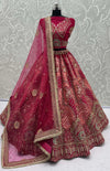 Rani Pink Gadhwal Silk Bridal Lehenga highlighting a stunning softnet dupatta drape for luxury bridal wear | BharatPlaza