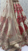 Ivory Red Gadhwal Silk Bridal Lehenga highlighting a stunning softnet dupatta drape for luxury bridal wear | BharatPlaza