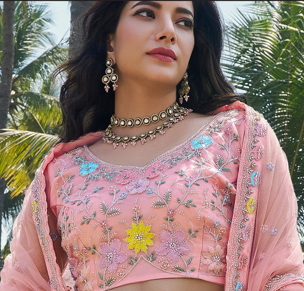 Trendy bridesmaid peach lehenga for Gurgaon wedding celebrations