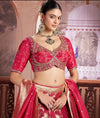 Red tissue silk bridal lehenga choli with zari embroidery for Indian wedding