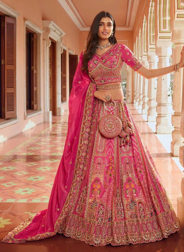 Rani Pink Banarasi Silk Designer Lehenga featuring a matching clutch and 4m flair for wedding & festive wear | BharatPlaza