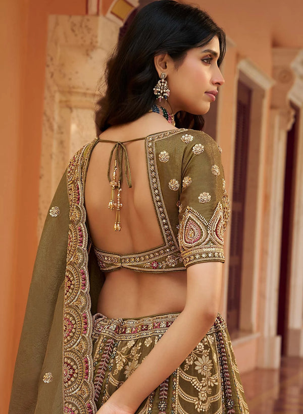 Olive Green Banarasi Silk Designer Lehenga showing beautiful blouse embroidery for wedding & festive wear | BharatPlaza