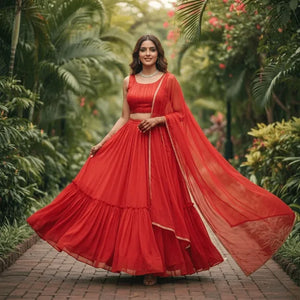 Lightweight party attire in a Red crimson flared lehenga for a sangeet occasion BharatPlaza