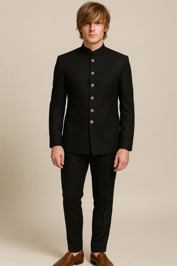 Front view of a black imported polyester Bandhgala Jodhpuri suit with gold-tone buttons for a New Jersey wedding