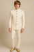 Full front view of an ivory Jodhpuri suit with matching trousers and gold-tone buttons for a Jaipur wedding