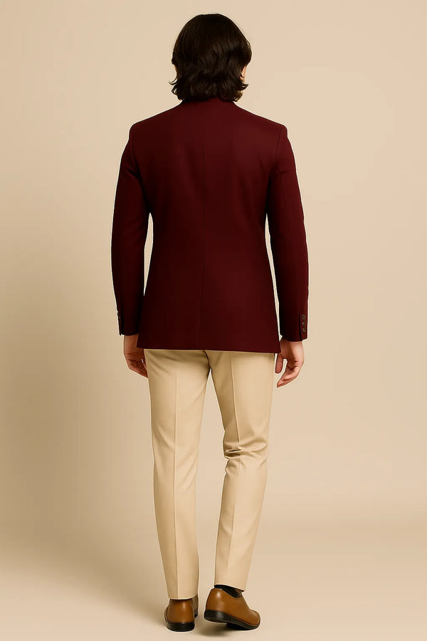 Back view of deep wine Jodhpuri coat with contrasting beige trousers for a Port Louis, Mauritius wedding