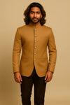 Front view of camel brown Jodhpuri suit with dark brown trousers for an Indian wedding in New York