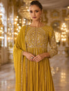 Close-up of round neckline, ornate bodice and three-quarter sleeve embroidery on Turmeric Yellow Anarkali