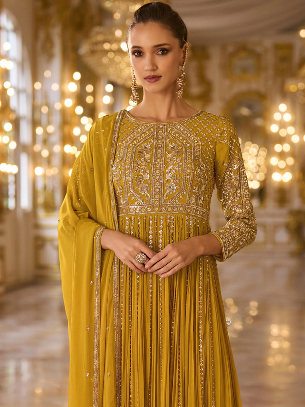 Close-up of round neckline, ornate bodice and three-quarter sleeve embroidery on Turmeric Yellow Anarkali