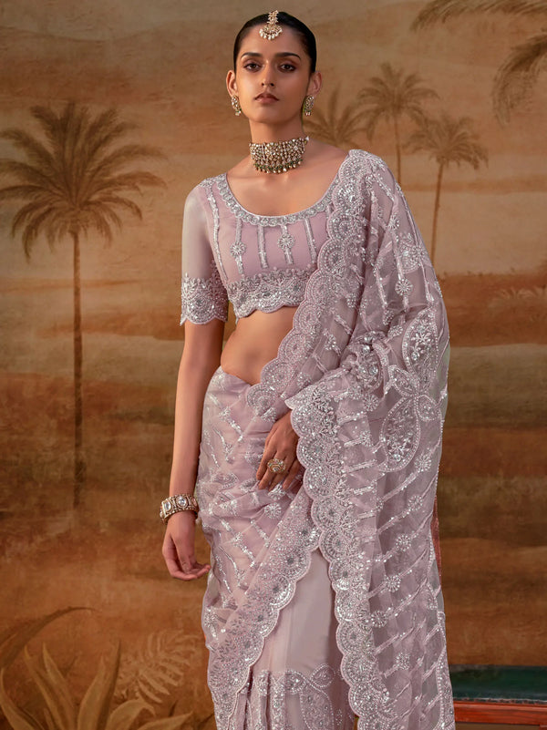 Lilac Purple Premium Net Designer Saree featuring a matching heavy embroidered blouse for luxury wedding wear | BharatPlaza