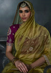 Olive Green Tissue Silk Organza Designer Saree styled elegantly as a bridal veil for luxury festive wear | BharatPlaza