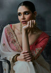 Off-White Tissue Silk Organza Designer Saree showcasing stunning back details and red blouse for luxury weddings | BharatPlaza