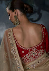 Golden Beige Tissue Silk Organza Saree showcasing stunning back red blouse embroidery for luxury weddings | BharatPlaza