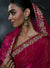 Rani Pink Tissue Silk Organza Designer Saree featuring an elegant drape over the head for luxury wedding wear | BharatPlaza