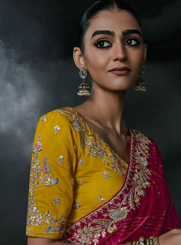 Rani Pink Tissue Silk Organza Designer Saree showcasing stunning yellow blouse sleeve embroidery for festive wear | BharatPlaza