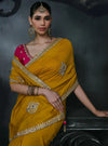 Mustard Tissue Silk Organza Designer Saree highlighting intricate stone motifs and fancy borders for parties | BharatPlaza