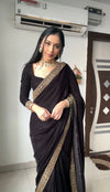 Elegant black designer saree with gold stitching around the edges light and fun holiday saree | BharatPlaza