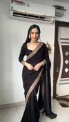 Black ready-made saree with modern drape made of chiffon silk for women to wear to a party | BharatPlaza