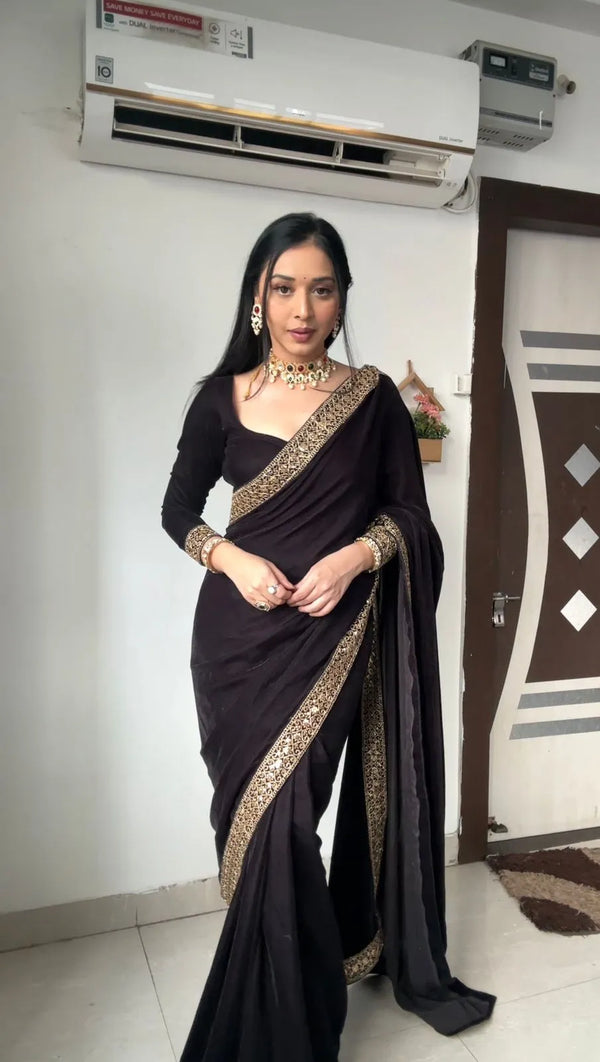 Black ready-made saree with modern drape made of chiffon silk for women to wear to a party | BharatPlaza