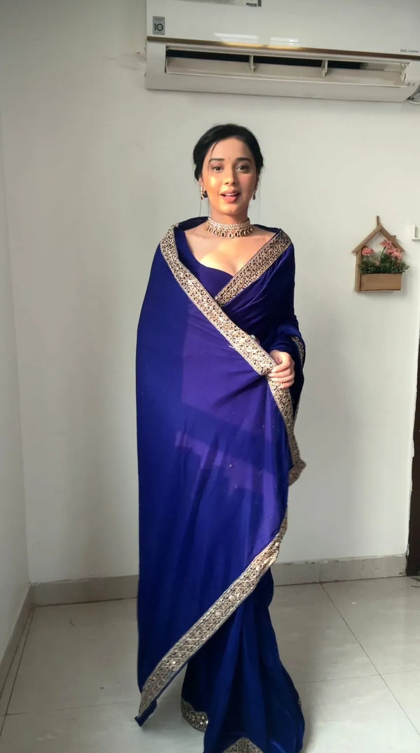 A chic blue saree with a golden border that is perfect for a wedding celebration | BharatPlaza