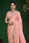 Peach Pink Premium Tissue Designer Saree featuring delicate shimmering weaving fabric for festive wear | BharatPlaza