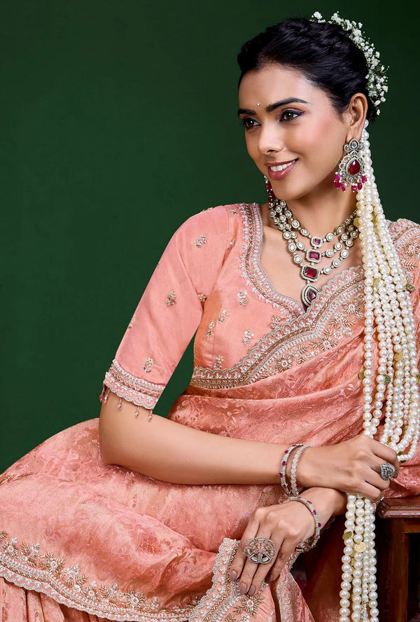 Peach Pink Premium Tissue Designer Saree highlighting an exquisite stitched readymade blouse for wedding wear | BharatPlaza