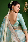 Aqua Blue Premium Tissue Designer Saree highlighting an exquisite back neckline blouse for wedding wear | BharatPlaza