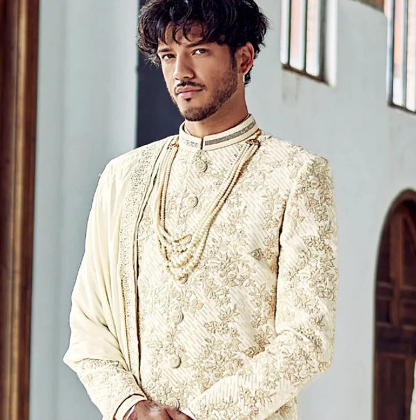 Wedding Lakhnavi sherwani in cream with dupatta and pearl mala
