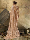 Back view of champagne peach heavy blouse with bead, pearl, sequin and zari work for an Indian wedding in Frankfurt