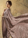 Heavy designer blouse back and sleeve work on dusty mauve saree for NRI wedding guests in Toronto
