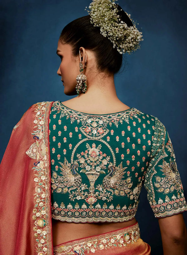 Peach Fancy Fabric Designer Saree featuring a contrasting heavy green stitched blouse for festive wear | BharatPlaza