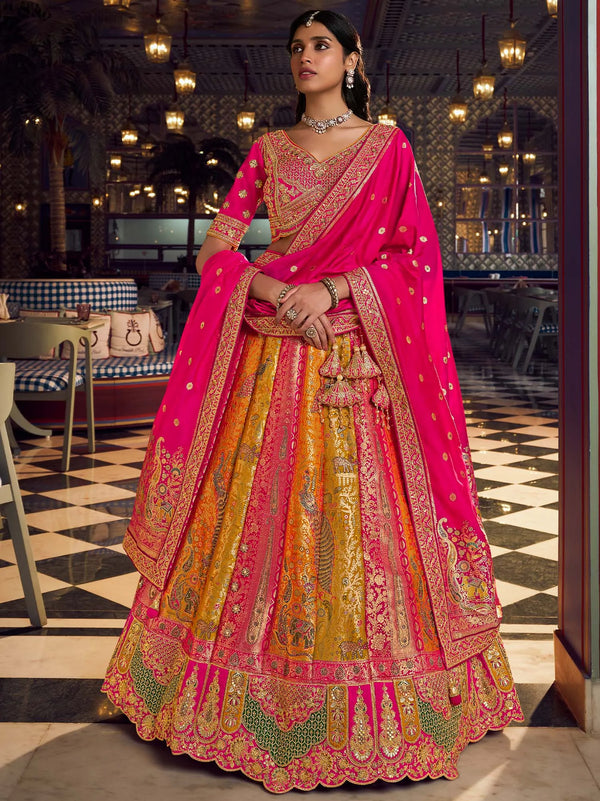Full view of pink Banarasi bridal blouse with tie-up tassels and zari embroidery for a wedding in Leicester