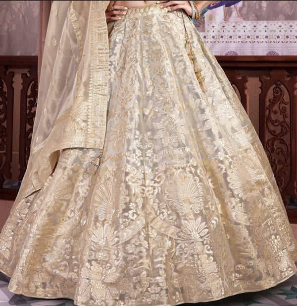 Shop Luxury tissue silk lehengas for engagement ceremonies.
