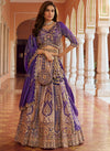Royal Purple Banarasi Silk Designer Lehenga highlighting beautiful tassel and belt for wedding & festive wear | BharatPlaza