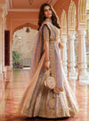 Lavender Banarasi Silk Designer Lehenga displaying a magnificent sweeping silhouette for festive wear | BharatPlaza