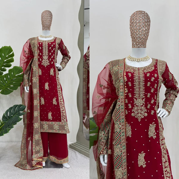 Red embroidered traditional outfit on a girl with a white background