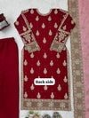 Back side design on Red embroidered outfit with gold patterns on a white background.