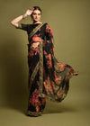 Black georgette saree with floral print and satin blouse