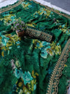 Fabric drape of green georgette saree with floral design and golden foil work