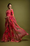 Pink georgette floral saree with foil border and satin blouse