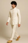 Side view of an ivory imported polyester Jodhpuri suit with matching trousers for a Sydney engagement