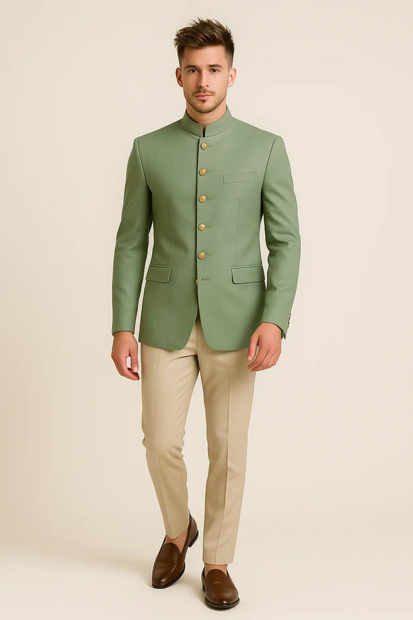Front view of sage green Bandhgala Jodhpuri suit with gold-tone buttons and beige trousers for a Jaipur wedding