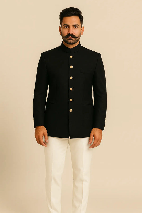 Front view of black Jodhpuri suit and ivory trousers styled for the father of the groom at a Brampton reception