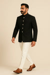 SJD005C.webpsjd005-black-ivory-jodhpuri-suit-chandigarh-side.webpSide view of black Bandhgala Jodhpuri suit with ivory trousers for a Chandigarh family wedding