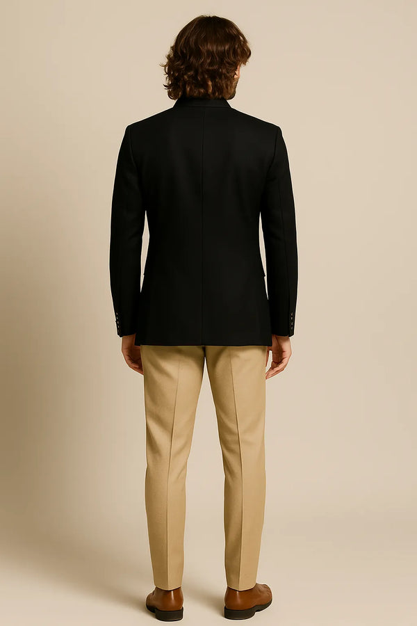 Back view of black Jodhpuri coat with contrasting tan trousers for an Oslo wedding celebration